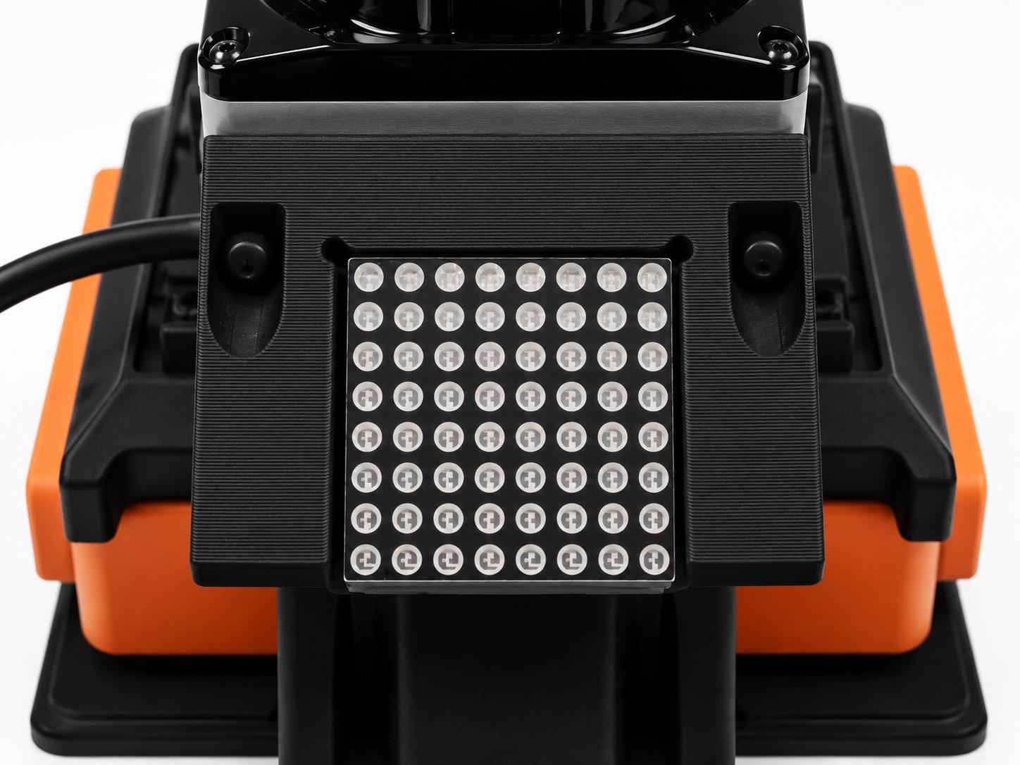 The 8 by 8 dot matrix mounted at the tail of the top stack, facing backwards