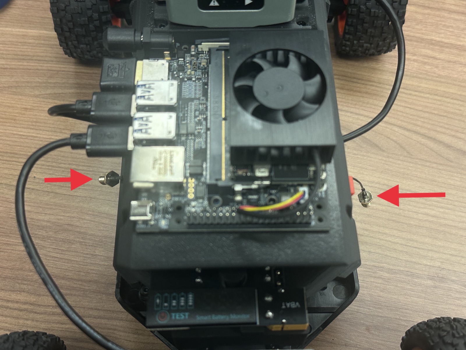 Click to enlarge The antenna cables routed through the chassis to the sides