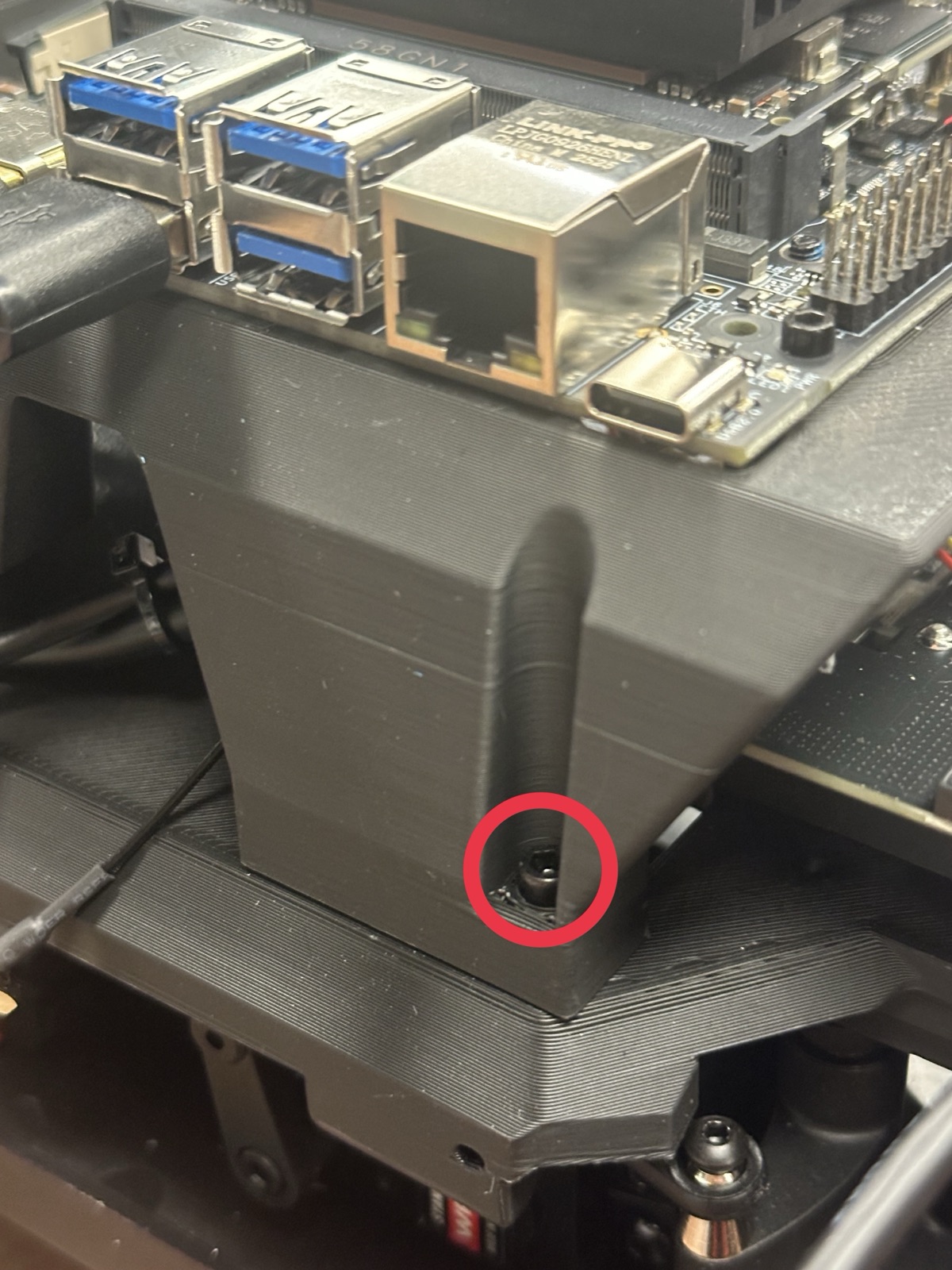 Click to enlarge The front-right top chassis screw